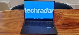 black Samsung Galaxy Book3 Ultra opened with techradar logo on display