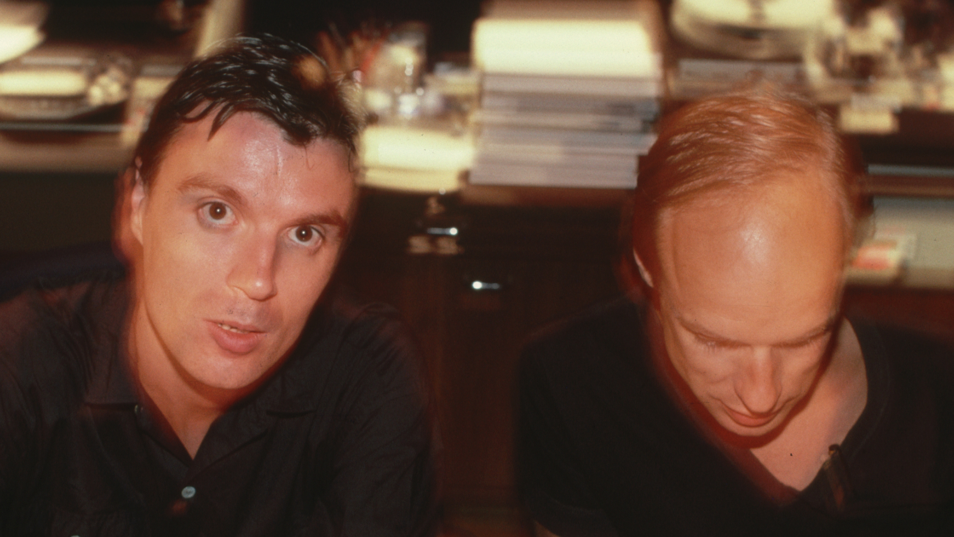 David Byrne, lead singer and guitarist for the Talking Heads, works with record producer Brian Eno in a recording studio in Mexico.