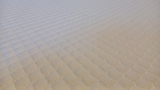 Closeup on stitching of the Simba Hybrid Essential Mattress Topper