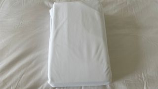 The Soak & Sleep Anti-Bed Bug Mattress Encasement on the sheets