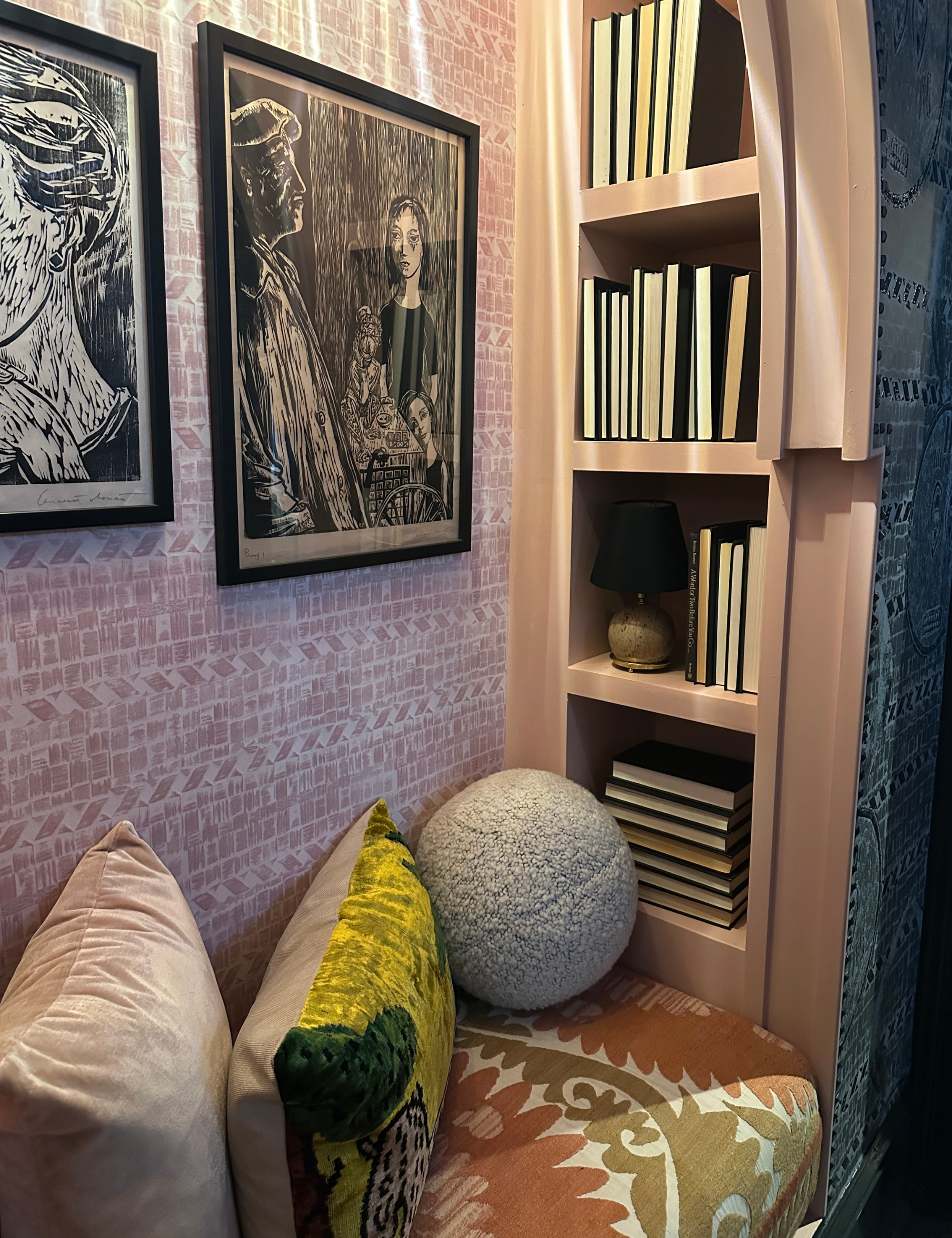 Reading nook featuring spherical throw pillows