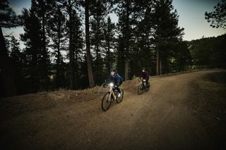 Two gravel riders at twilight