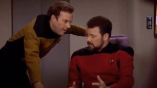 Barclay and Riker have a tense discussion