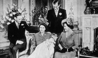 The then-Princess Elizabeth and Prince Philip with Prince Charles, King George and Queen Elizabeth