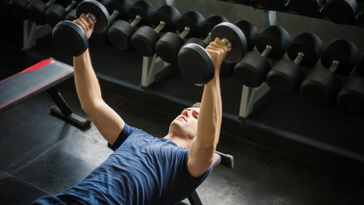 Two dumbbells, a bench and these four exercises to add strength and muscle to your entire body