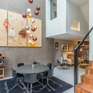 living room with dining table chair and reading nook