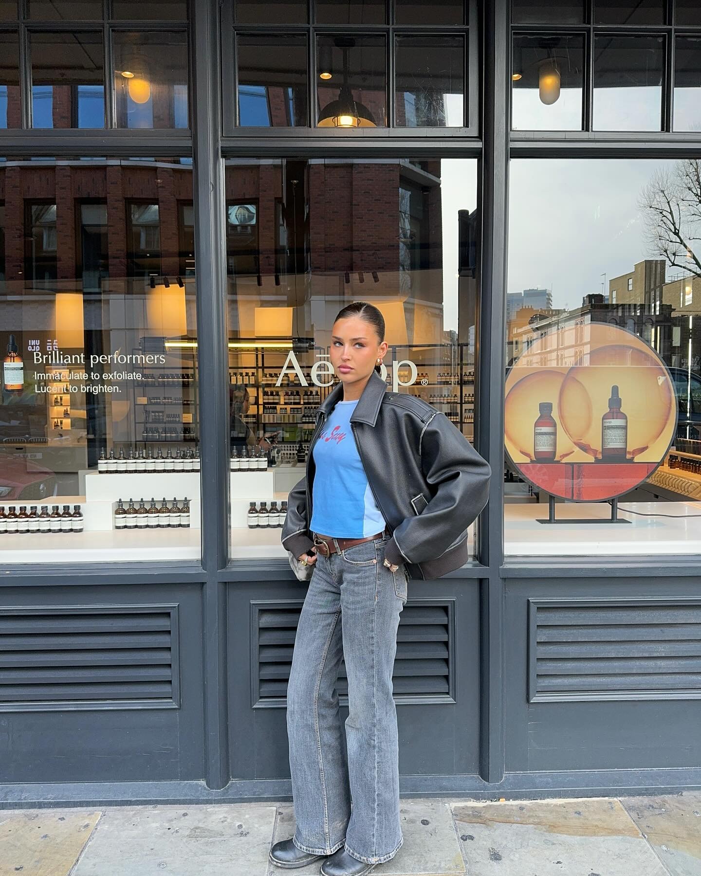 Fashion person Tegan Amelia Barker @teganameliabarker wears shoes to wear with grey jeans.