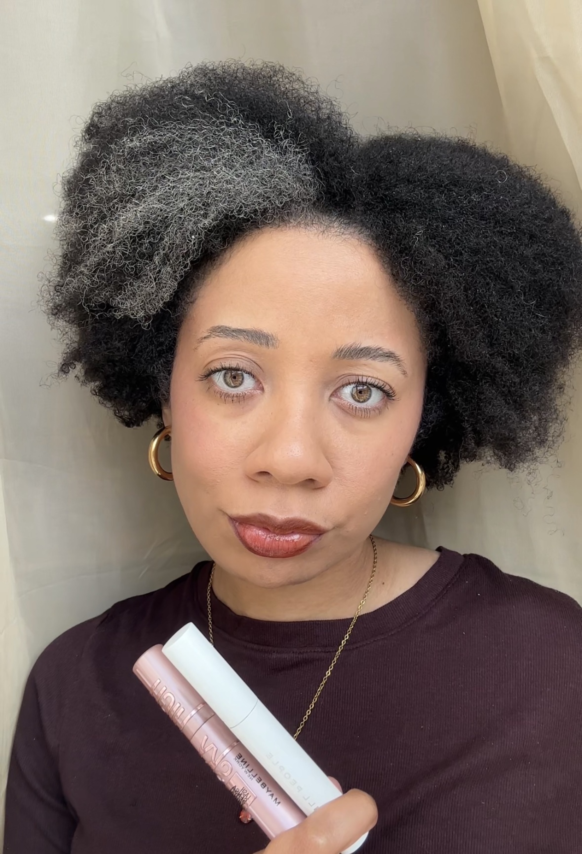 Eden Stuart wearing drugstore mascaras from Maybelline and Well People.