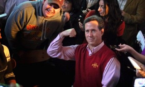 Rick Santorum poses for a picture while stumping in Iowa: The former senator&amp;#039;s poll numbers are skyrocketing, but critics believe he&amp;#039;ll fall back to Earth like so many other flavors of the mo