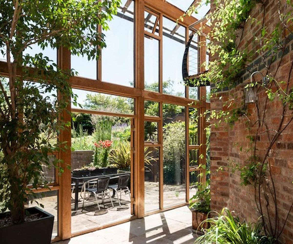 The inside of a conservatory showing a wooden structure