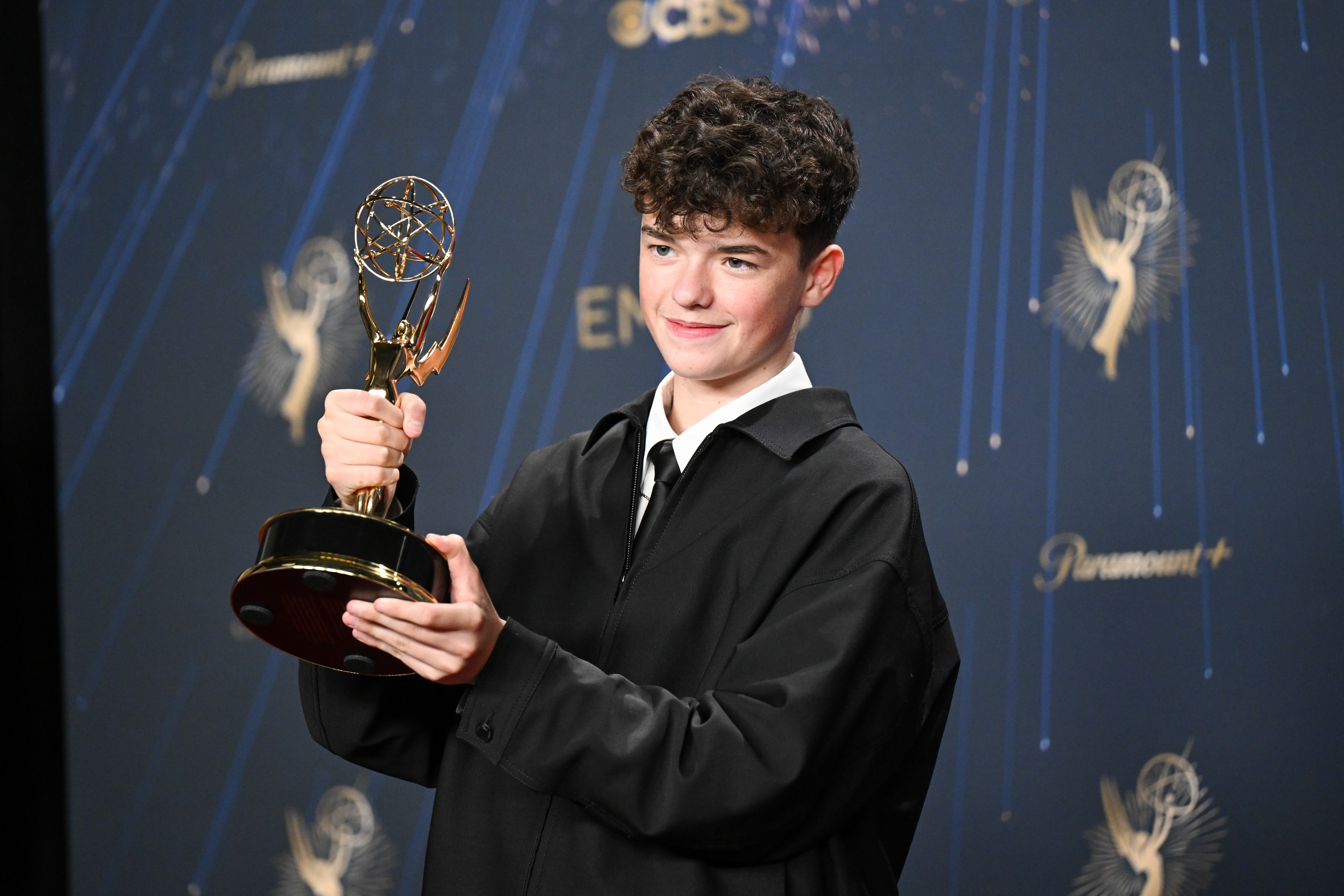 Owen Cooper poses with the Outstanding Supporting Actor in a Limited or Anthology Series award for &quot;Adolescence&quot; at the 77th Primetime Emmy Awards held at the Peacock Theater on September 14, 2025 in Los Angeles, California.