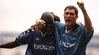 8 Aug 1998: Shaun Goater of Manchester City and team mate Lee Bradbury celebrate during the Nationwide Division One game against Blackpool at Maine Road in Manchester, England. City won 3-0. \ Mandatory Credit: Ross Kinnaird /Allsport