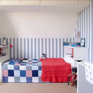kids bedroom with blue and white strip wall