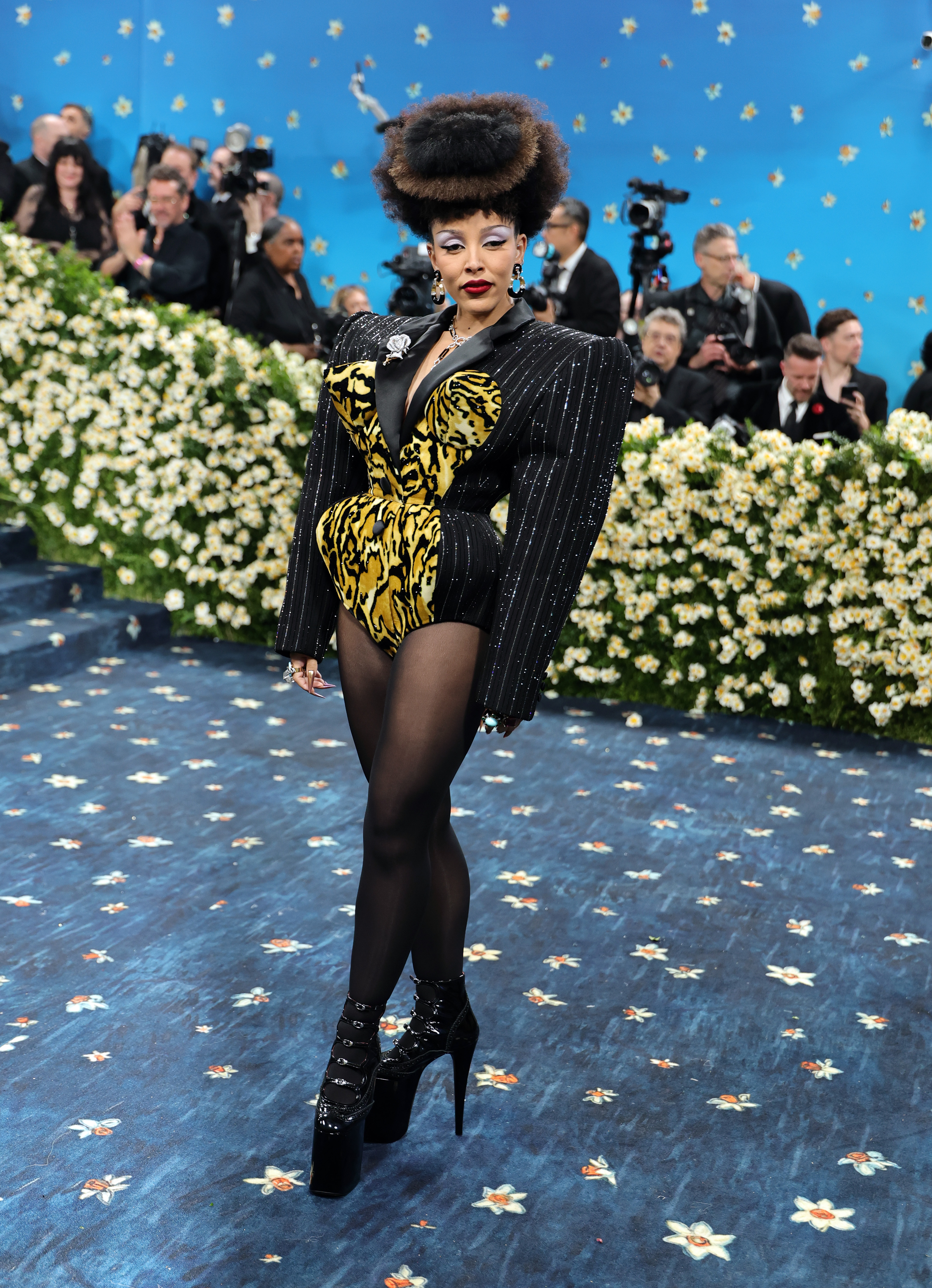 Doja Cat attends the 2025 Met Gala Celebrating "Superfine: Tailoring Black Style" at Metropolitan Museum of Art on May 05, 2025 in New York City in a leopard marc jacobs bodysuit