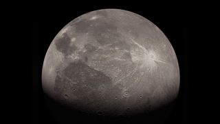 a gray moon pockmarked with craters