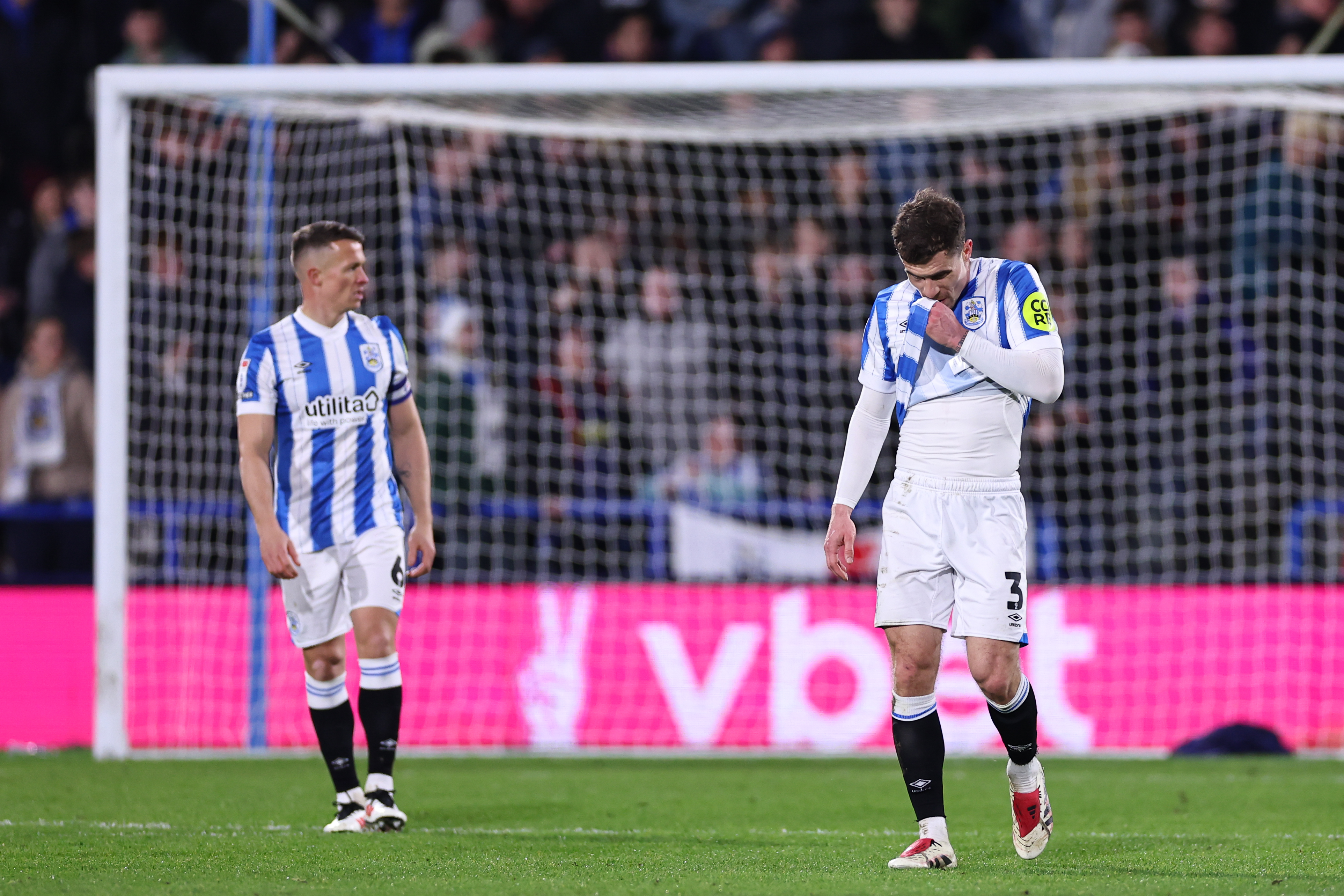 Jonathan Hogg and Josh Ruffels of Huddersfield Town look dejected during their 1-0 defeat to Wrexham