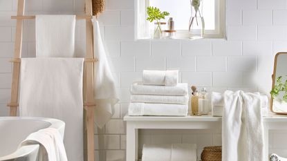 white and beige towels