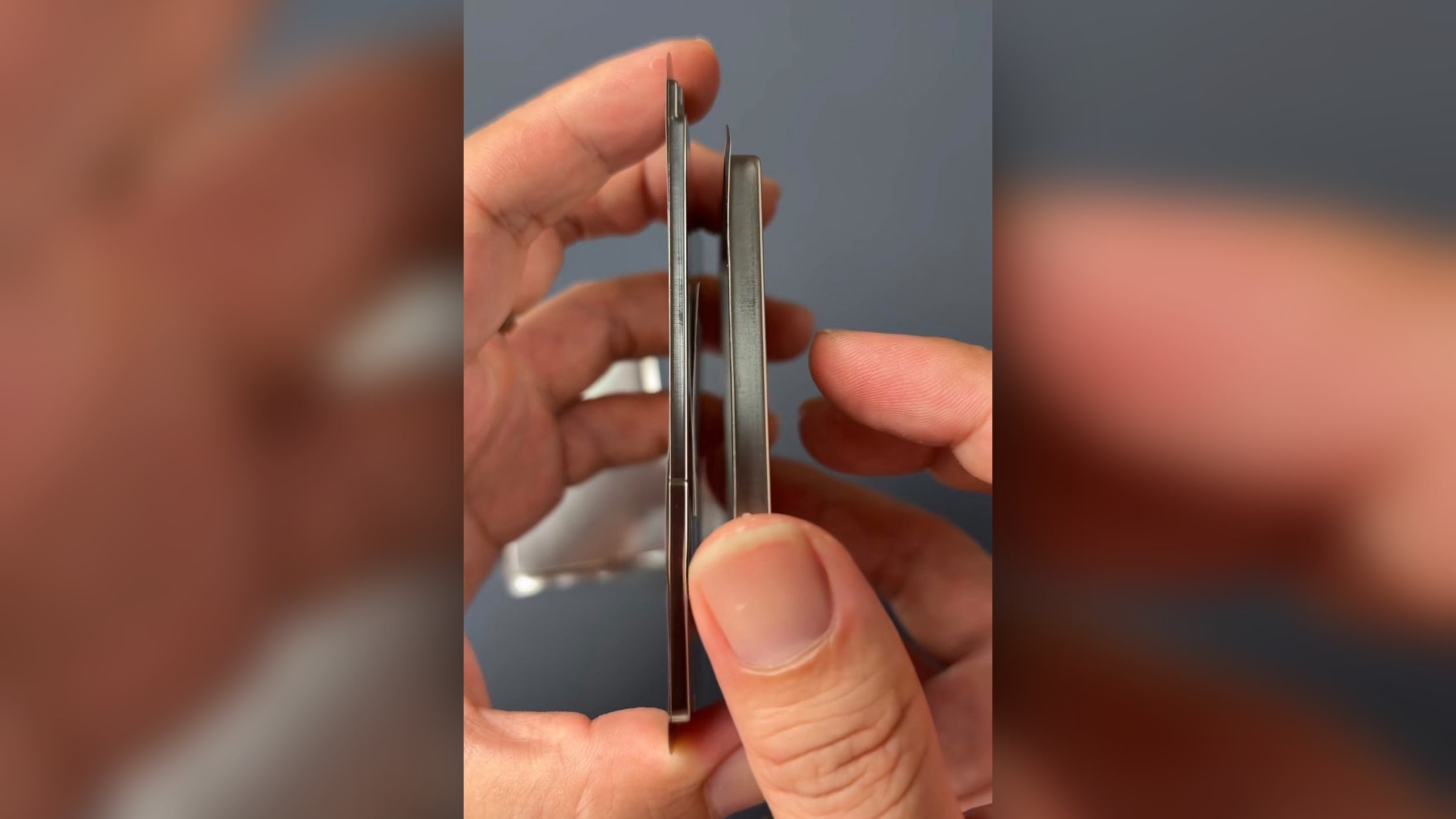 A person holds two batteries purporting to be from the iPhone 17 Air and the iPhone 17 Pro.