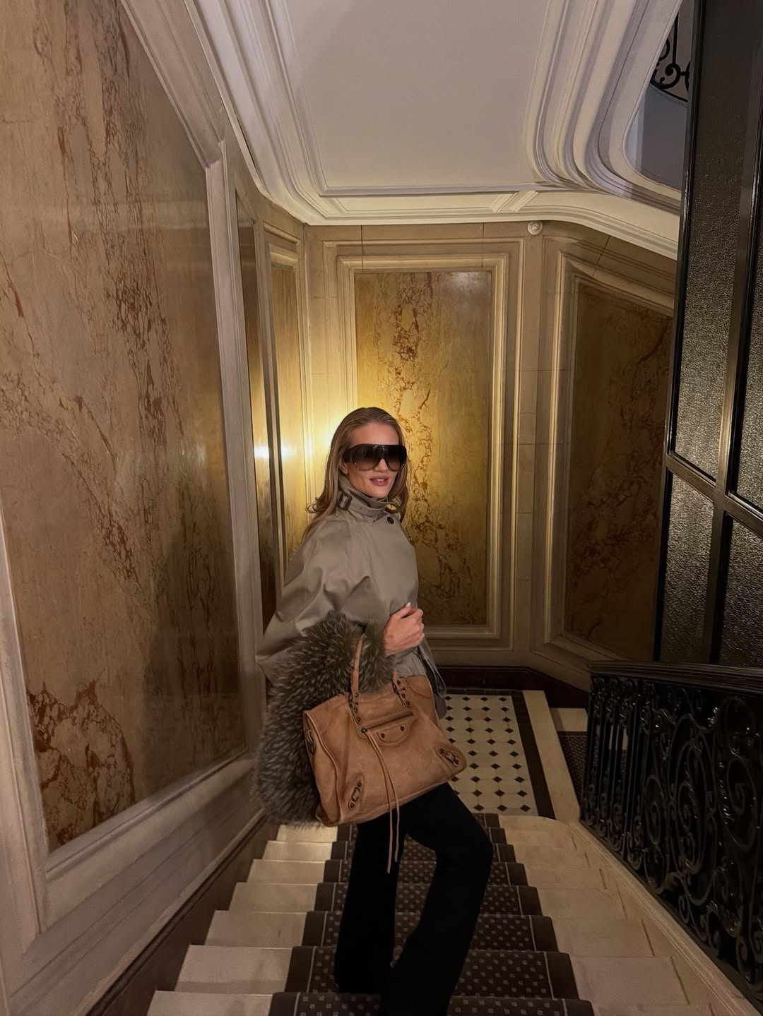 Celebrity 2026 fashion trends: Rosie HW wearing big sunglasses