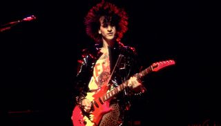 Steve Stevens performs with Billy Idol at the Poplar Creek Music Theater in Hoffman Estates, Illinois on June 1, 1984