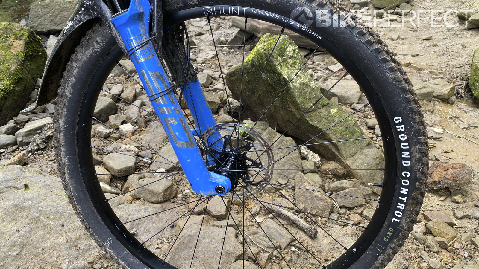 Hunt Trail Wide V2 wheels resting on rocky singletrack