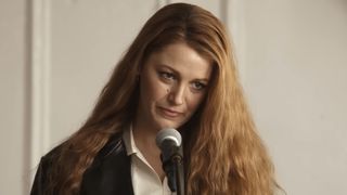 Lily Bloom (Blake Lively) speaks at her father's funeral in It Ends with Us.