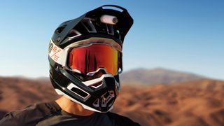 Insta360 Go3 mounted to a full face helmet