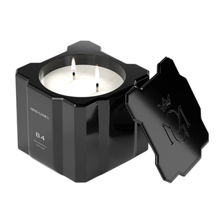 black candle with geometric shape