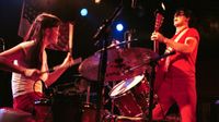 Jack WHITE and Meg WHITE and WHITE STRIPES; Meg and Jack White performing on stage 