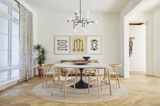 light neutral dining room with round dining table