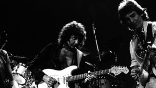 Ian Gillan and Ritchie Blackmore of Deep Purple perform on stage with George Harrison on the Perfect Strangers World Tour at the Entertainment Centre, Sydney, 12th December 1984