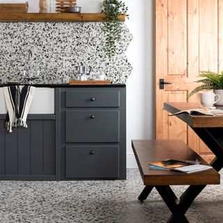 kitchen with terrazzo tiles and grey drawers