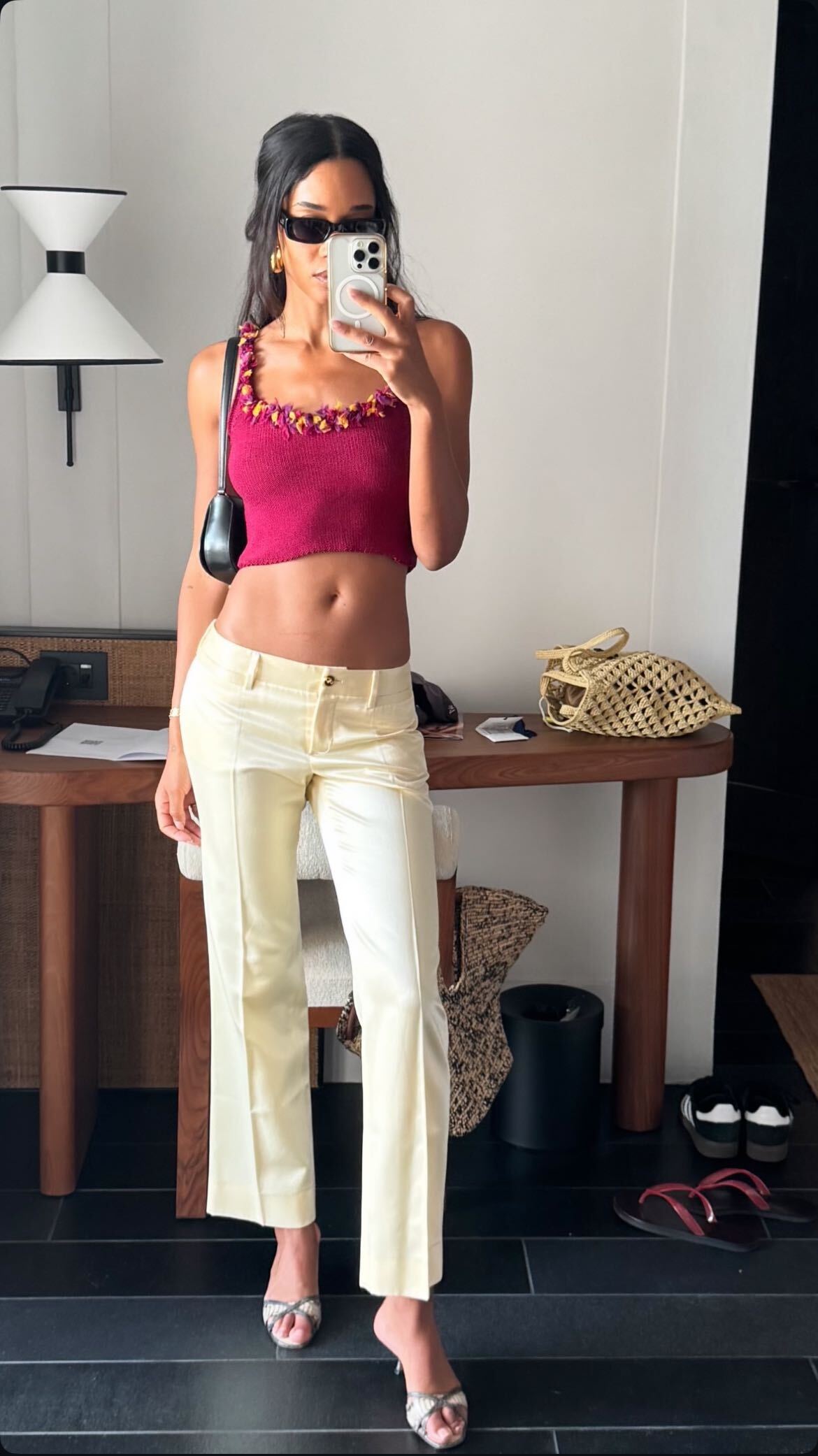 Laura Harrier in cut pants