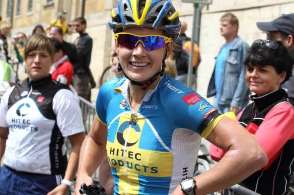 Emma Johansson (Hitec Products) waits for her team mates, to celebrate her overall win