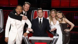The Voice Season 21 coaches and Carson Daly.