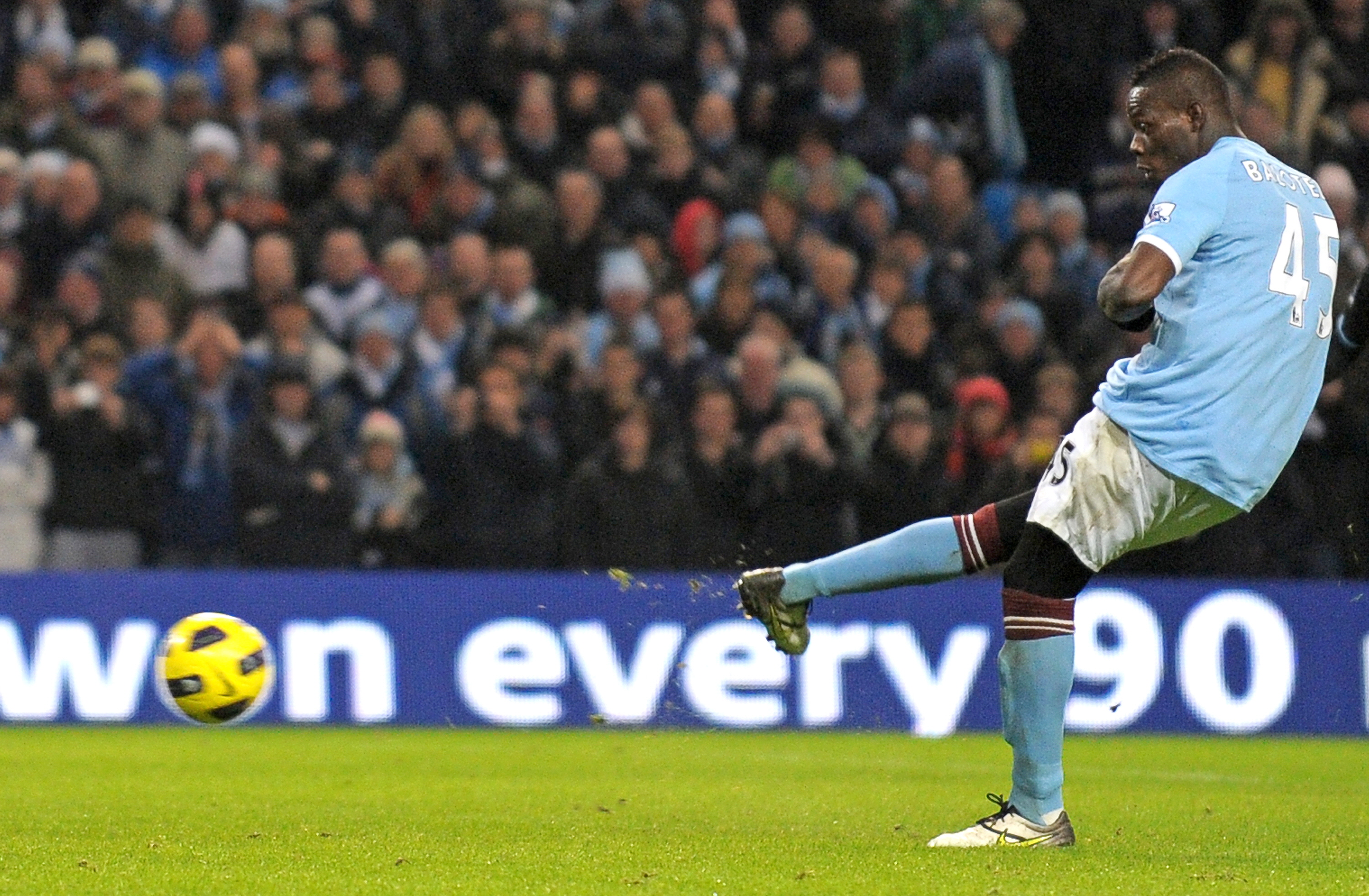 Mario Balotelli scores a penalty for Manchester City against Aston Villa in December 2010.