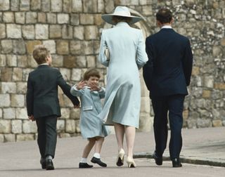 From left to right, Peter Phillips, Prince William, Diana, Princess of Wales (1961 - 1997) and Prince Charles attend the Easter service at Windsor, 19th April 1987.
