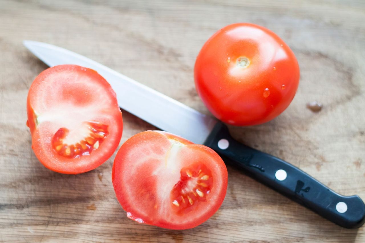 Whole And Sliced Tomatoes