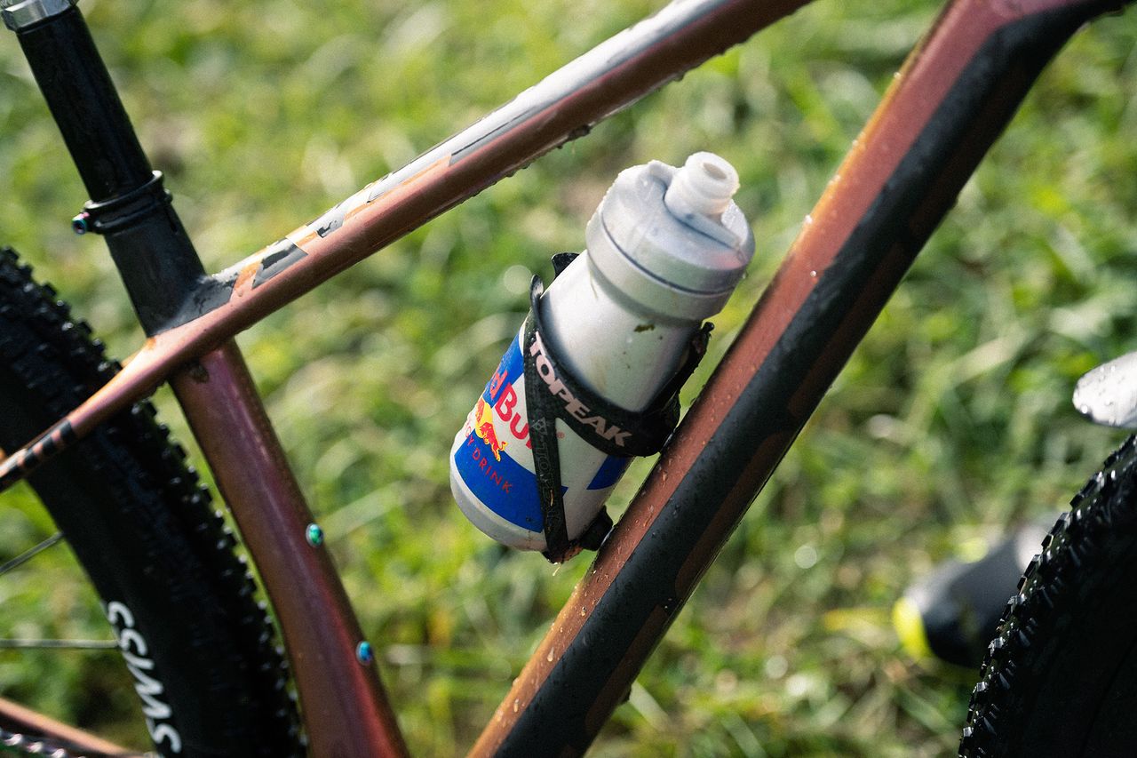 No doubt the branding and contents don't correspond, but Kate' hydration bottle is kept in place by a Topeak carbon cage