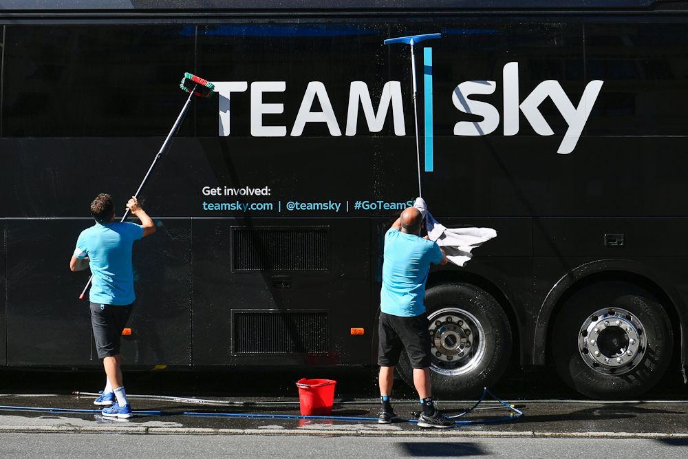 team Sky staff wash the bus during the second rest day at the Tour de France