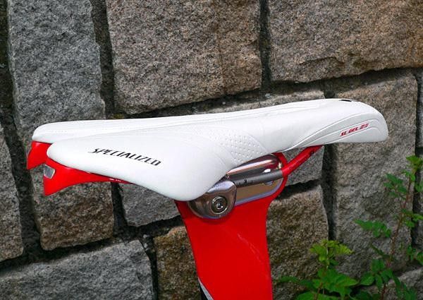 A pair of rear protrusions is designed to fit bike racks in the transition area.