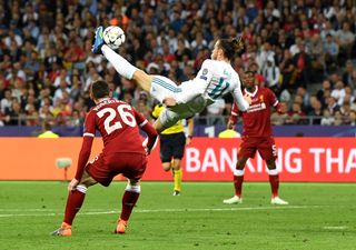 Gareth Bale launches himself into the air to score an overhead kick for Real Madrid against Liverpool in the 2018 Champions League final.