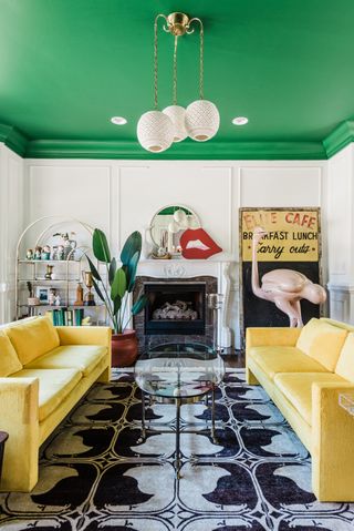 A green ceiling and yellow sofa
