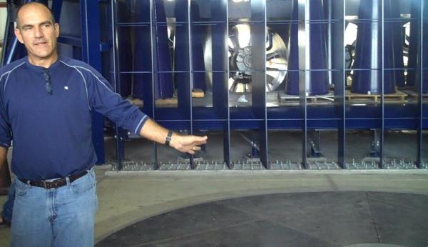 Inside the hanger, project leader Walter Conklin talks turntables.
