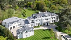 'The biggest and most exceptional house in St George's Hill' Excess £25m. 