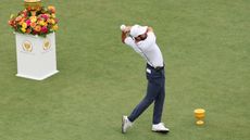 Cameron Young hits a fairway wood off the tee