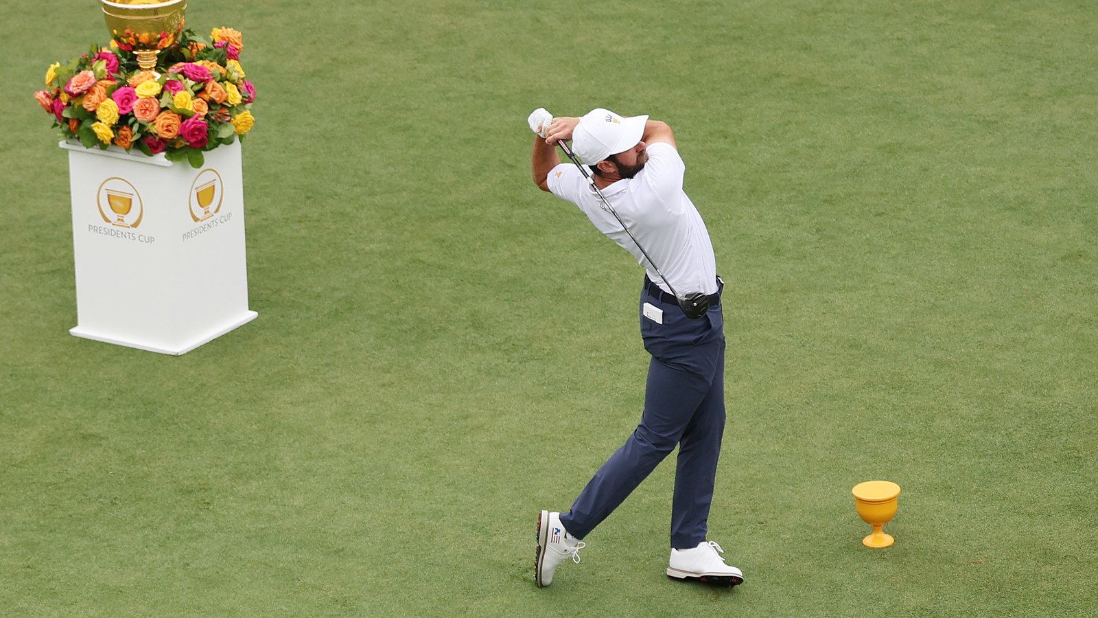 Cameron Young hits a fairway wood off the tee