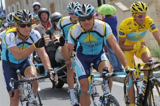 Astana teammates Lance Armstrong, Yaroslav Popovych and Alberto Contador enjoy a well earned tipple