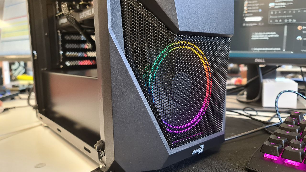 Budget PC case on a desk, including those from Aerocool, Bitfinix, and Kolink