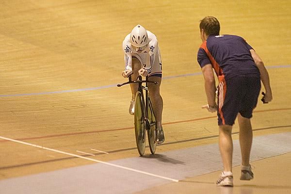 Wendy Houvenaghel (Great Britian) receives encouragement from support staff as she powers towards a gold medal in the women